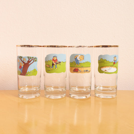 Set of four Ashby Golf cartoon golfer highball drink glasses with a gold rim