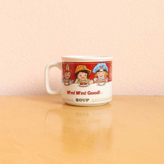 Campbell's soup vintage coffee mug with children dress up as a conductor, nurse, doctor, firefighter, construction worker, and police officer. Vintage from the 1990s
